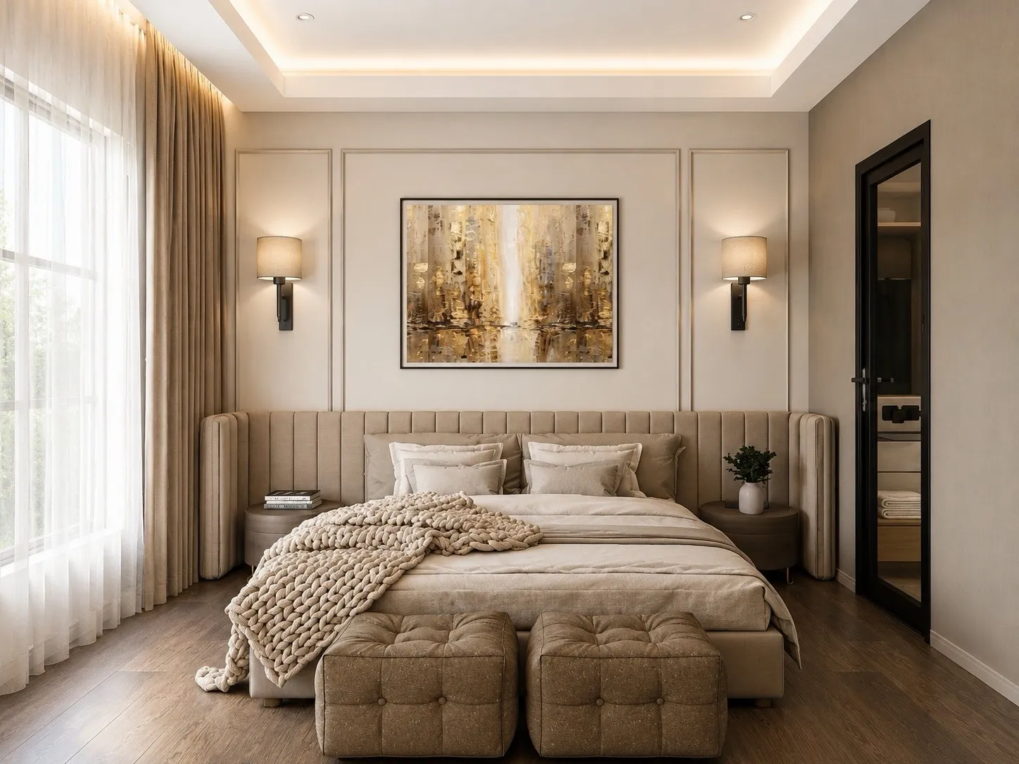 Guest bedroom with a channel-tufted headboard wall, brass-and-black sconces, a gold-toned abstract artwork and two upholstered ottomans.
